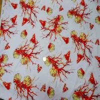 Lycra blanc imprimé coquillage corail lurex doré