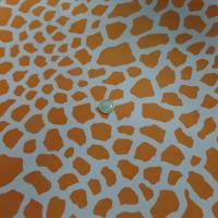 tissu Lycra double face imprimé girafe ton orange et blanc