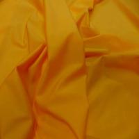 Lycra extensible dans le 2 sens jaune orange