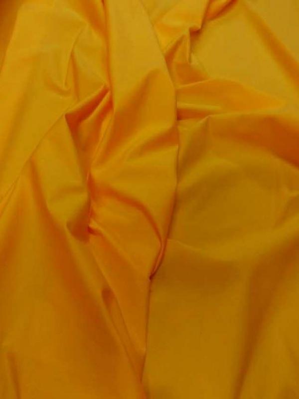 Lycra extensible dans le 2 sens jaune orange