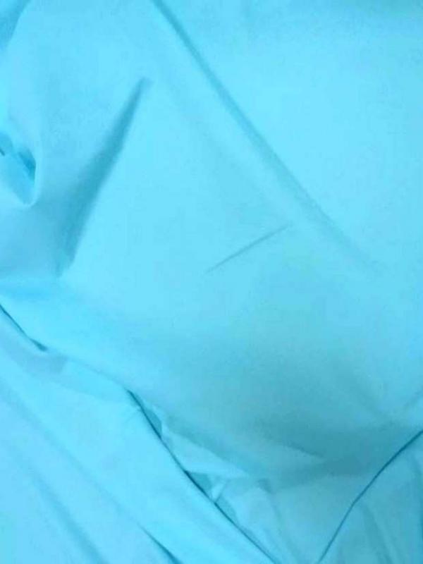 Lycra extensible dans le 2 sens ton bleu clair