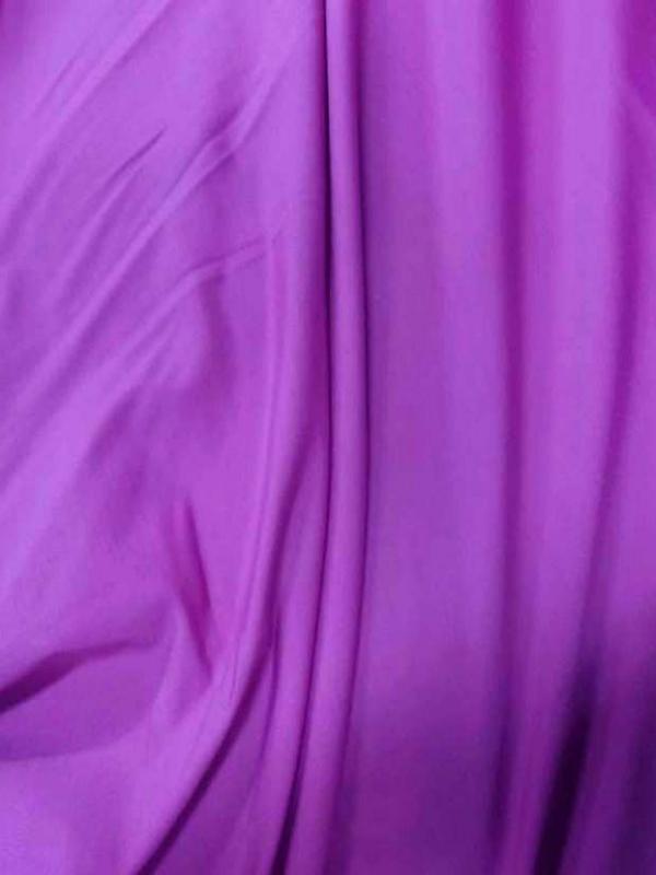 Lycra extensible dans le 2 sens ton rose fuchsia