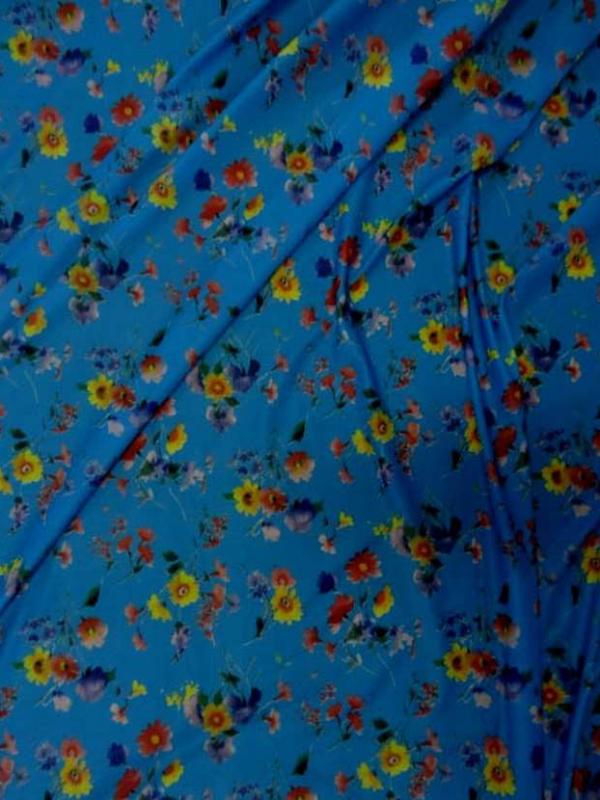 Lycra fin bleu imprime fleurs