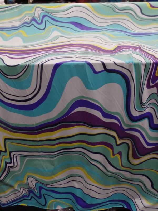 Lycra imprime annee 70 ton blanc bleu jaune et viole5