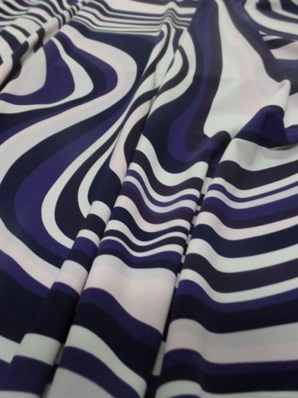 Tissu lycra imprimé année 70 ton blanc violet rose et noir