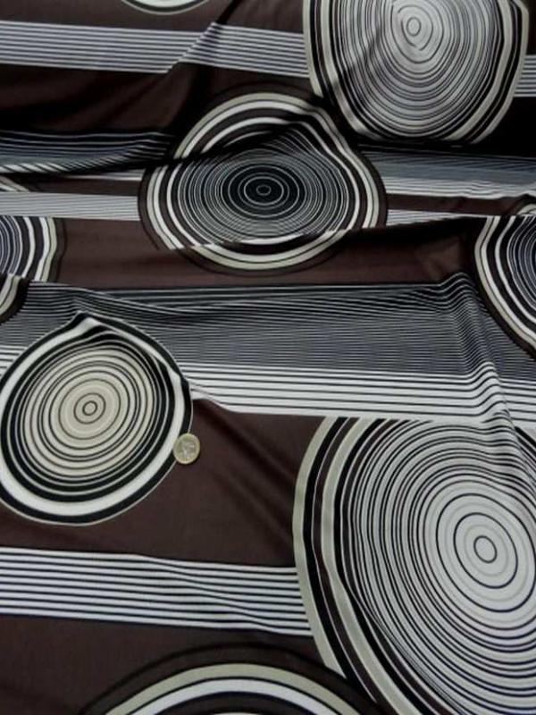 Lycra imprime annee 70 ton marron blanc