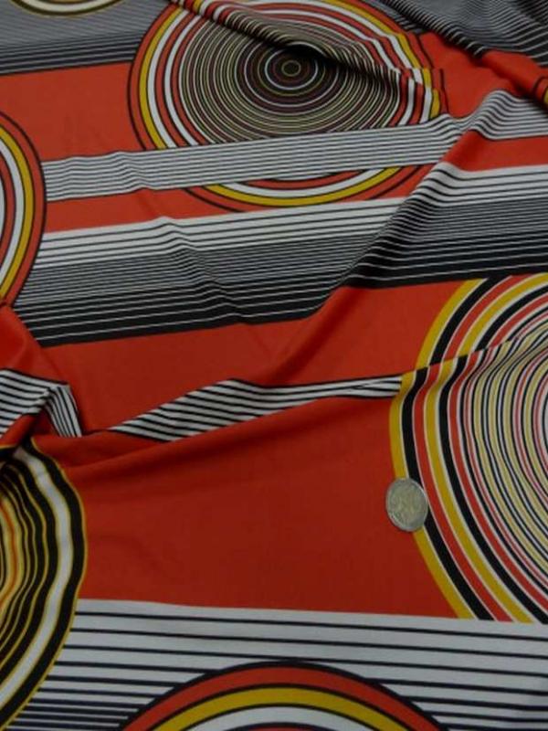Lycra imprime annee 70 ton orange rouille jaune blanc noir