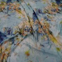 Lycra imprime fleurs ton bleu jaune safran