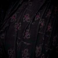 Lycra noir faconne fleurs lurex rose