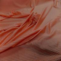 Lycra orange satine a petit pois noir1