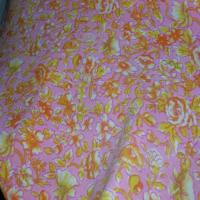 Lycra rose imprime fleurs jaune orange