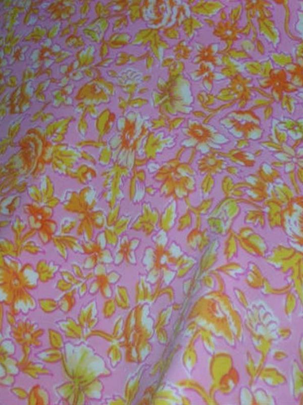 Lycra rose imprime fleurs jaune orange