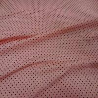 Lycra rose saumon clair a pois noir