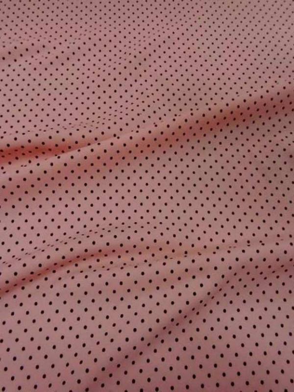 Lycra rose saumon clair a pois noir