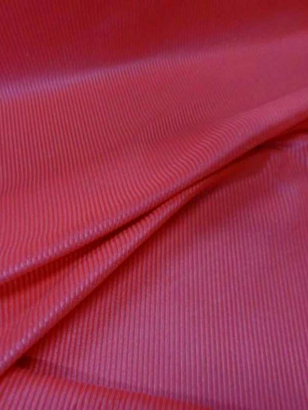 Lycra uni brillant a cotes saumon