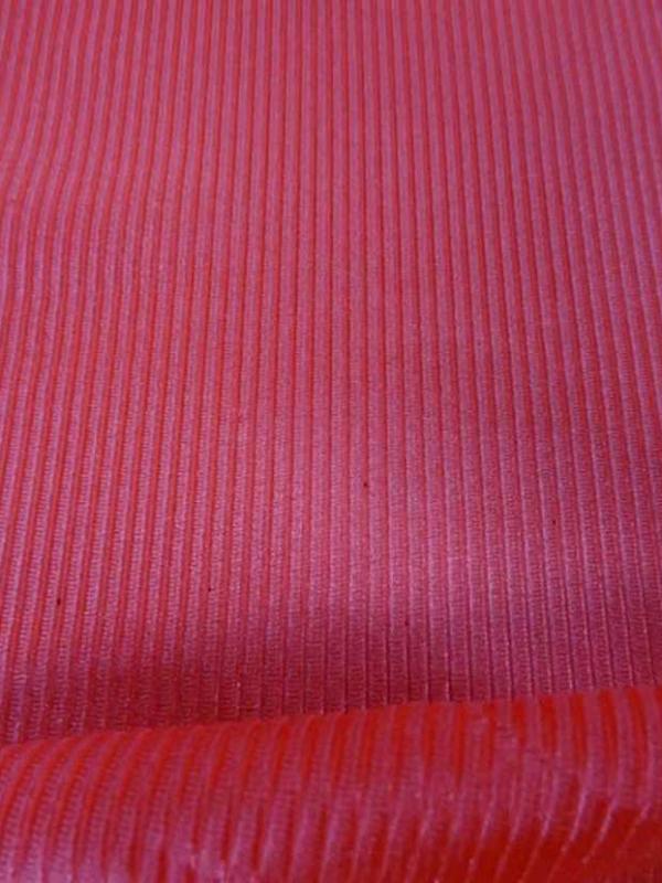 Lycra uni brillant a cotes saumon
