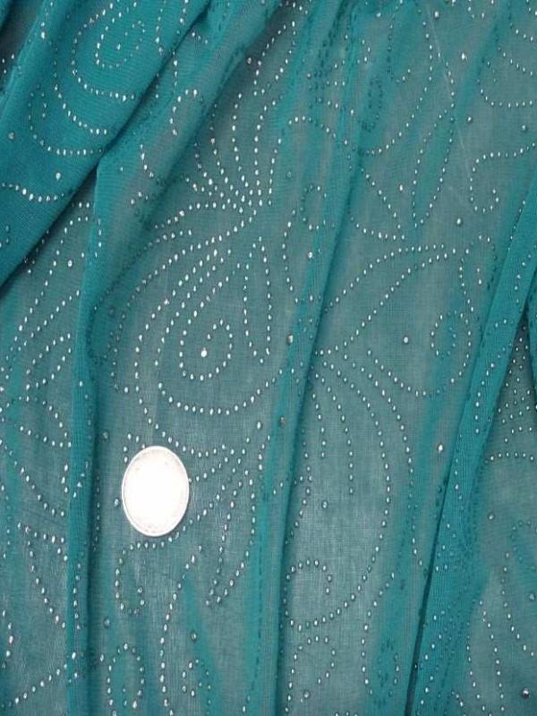 Maille jersey bleu clair a motifs dore