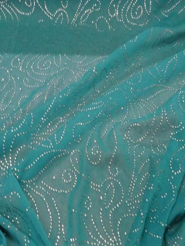 Maille jersey bleu clair a motifs dore