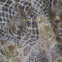 Maille lycra très fine imprimé tête de zèbre et tête de lion