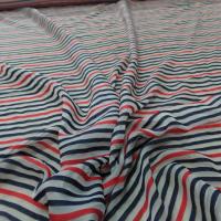 tissu mousseline de soie blanche dévoré bandes noire et rouge