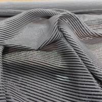 Mousseline de soie grise a rayures lurex noire