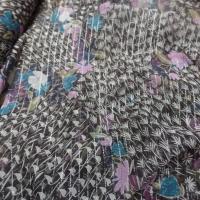 Mousseline de soie noire a bande lurex metal imprime fleurs
