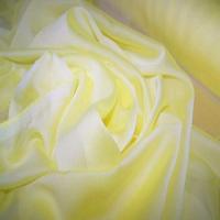 Mousseline polyester uni jaune