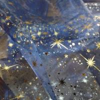 Organza bleu foncé a étoiles couleur métal et doré en ligne