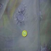 Organza ton mauve brode soleil