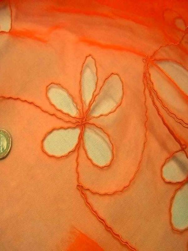 Organza ton orange a motifs ajoures