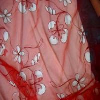 Organza ton rouge a motifs ajoures