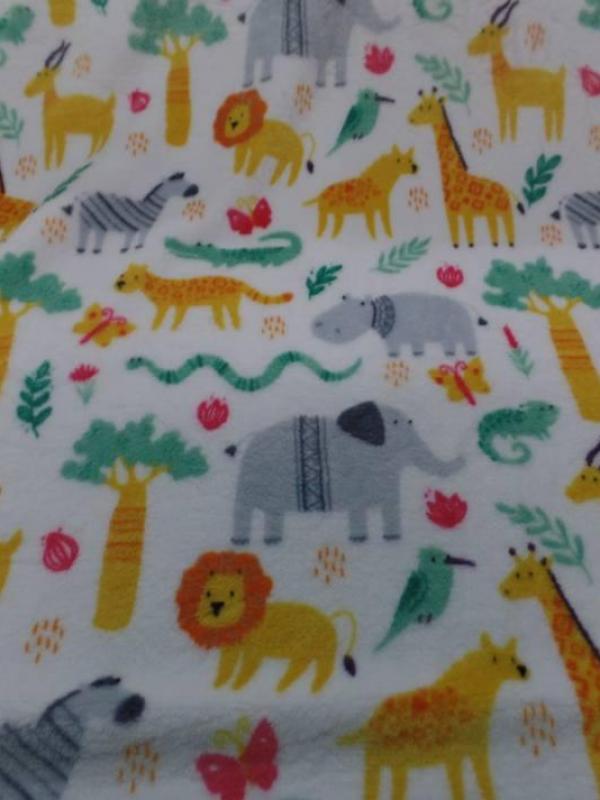 Polaire doudou blanc imprime motifs animaux