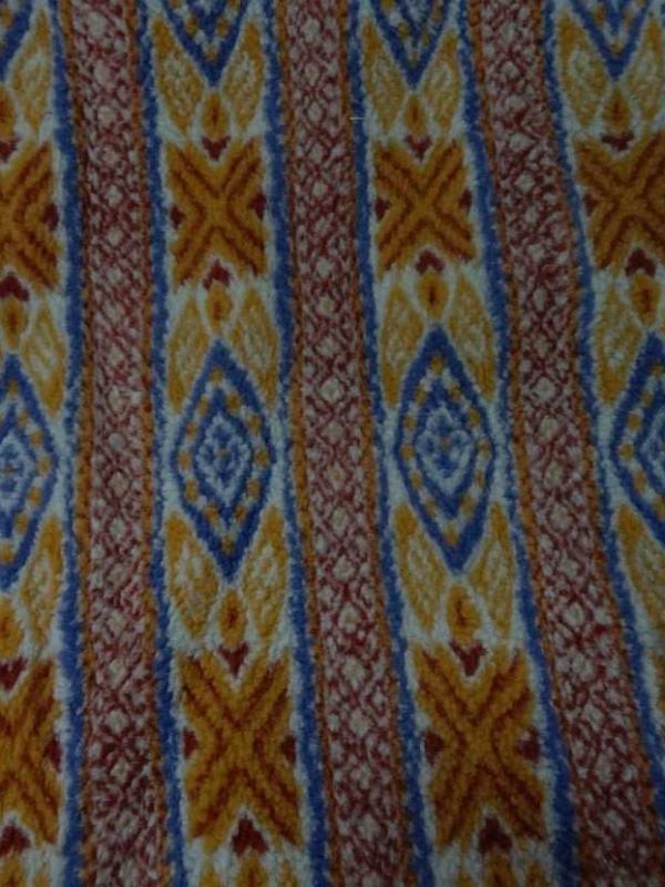 Polaire epaisse a motifs ton rouille bleu