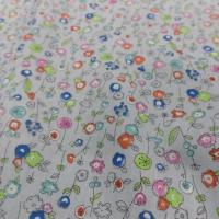 Popeline coton gris fleurs bleu orange vert et rose