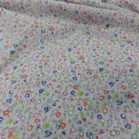 Popeline grise en coton 100% imprimé fleurs bleu orange vert et rose