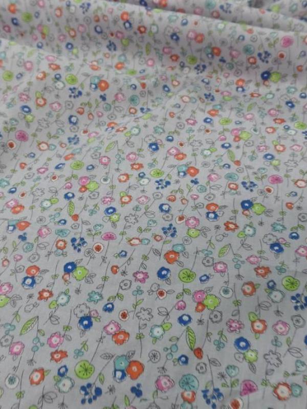 Popeline coton 100 imprime fleurs bleu orange vert et rose0