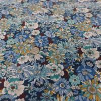 Popeline coton 100 imprime fleurs ton bleu blanc vert