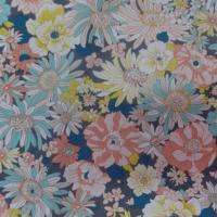 popeline coton 100% imprimé fleurs ton jaune et bleu pastel