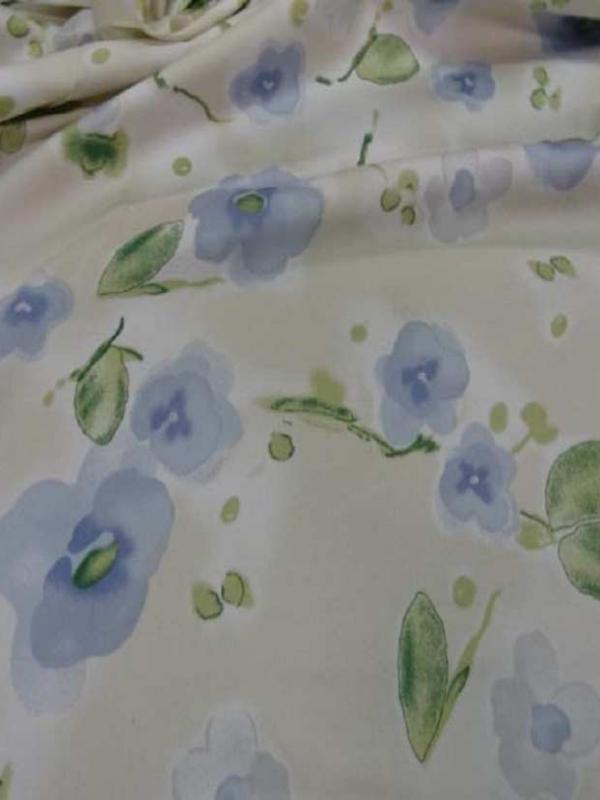 Popeline coton lycra beige imprime fleurs bleu