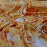 Satin extensible dans la largeur imprimé ton orange