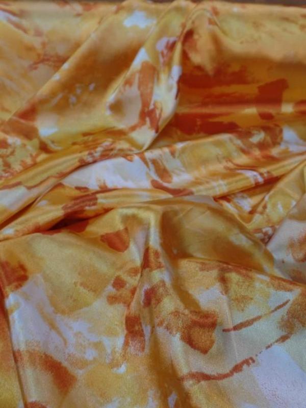 Satin extensible dans la largeur imprimé ton orange