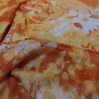 Satin lycra dans la largeur imprimé ton orange