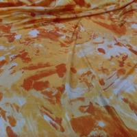 tissu Satin lycra dans la largeur imprimé ton orange