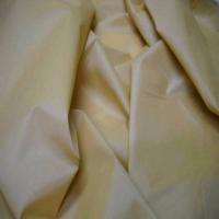 Taffetas lycra souple beige jaune reflets blanc