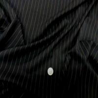 Tergal stretch noir a rayure cuivre