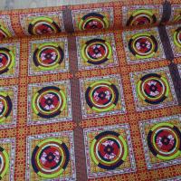 vente de tissu africain Wax rouge imprimé jaune ,noir au mètre sur MARSEILLE
