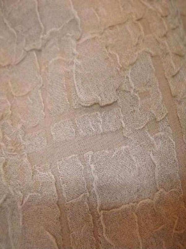 Tissu beige faconne
