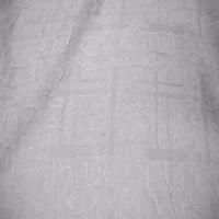 Tissu blanc faconne