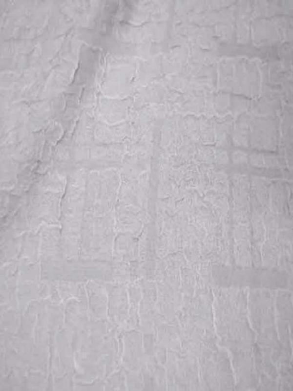 Tissu blanc faconne