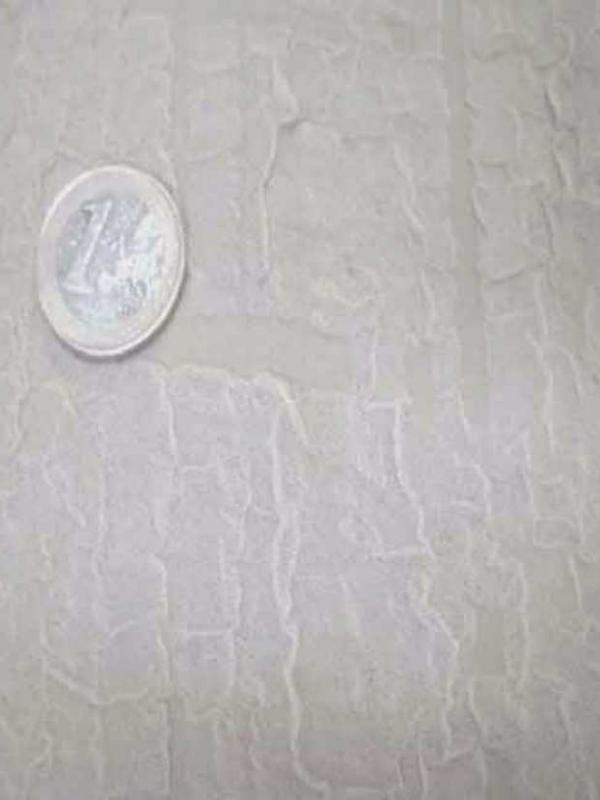 Tissu blanc faconne